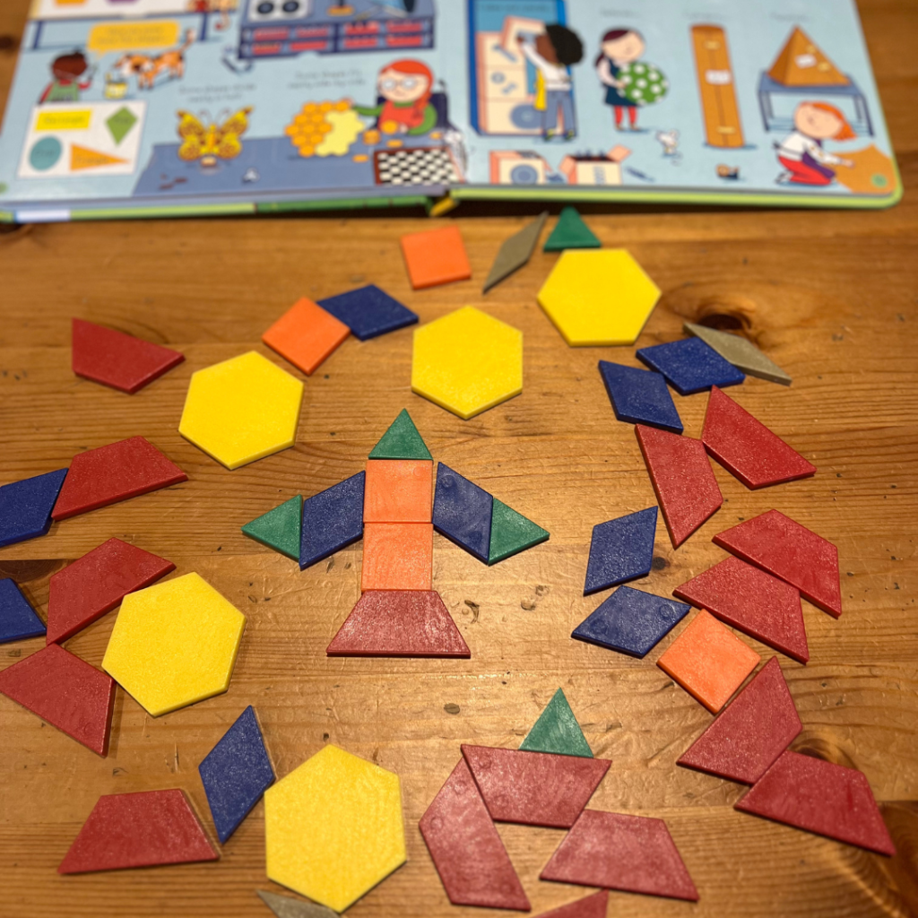 Selection of tangram shapes spread on a table