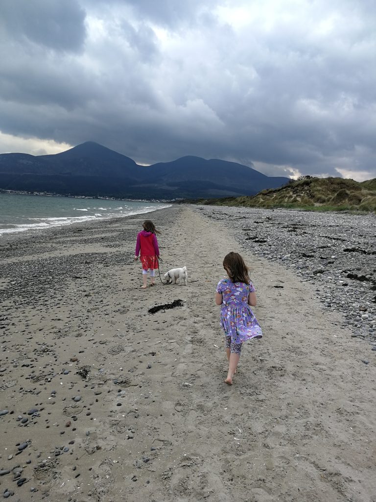 Children walking along the Murlough Nature Reserve