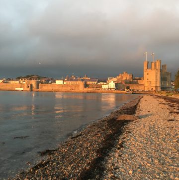 View of Caernarfon Castle at sunset